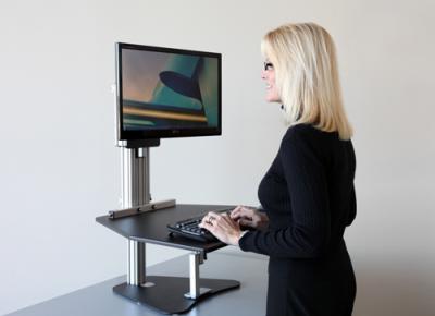 WHAT ARE THE ADVANTAGES OF USING A STAND UP DESK?